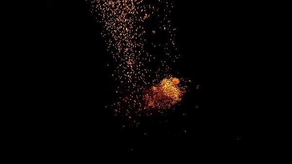 Falling Sparks and Embers Landing Sparks High Angle 10 Continuous vfx asset stock footage