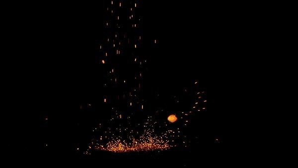 Falling Sparks and Embers Landing Sparks Low Angle 3 vfx asset stock footage