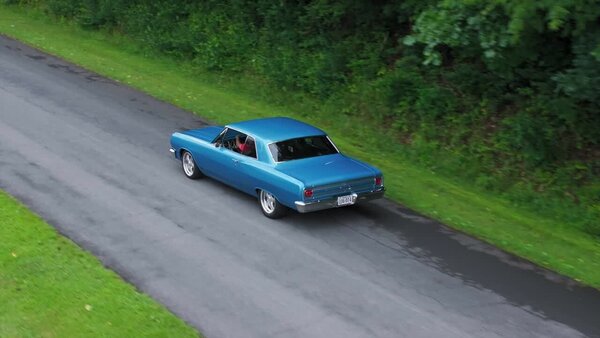 Aerials of Classic Car on Road Clip 7 vfx asset stock footage