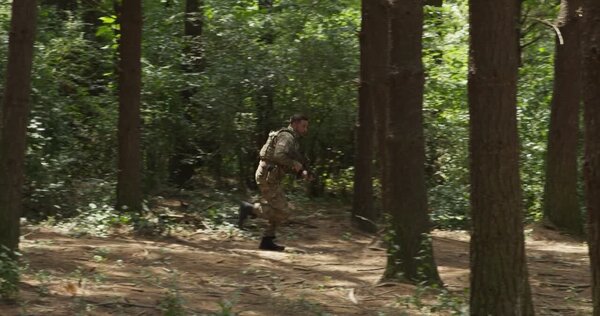 Soldier Evades Gunfire in Woods Clip 2 vfx asset stock footage