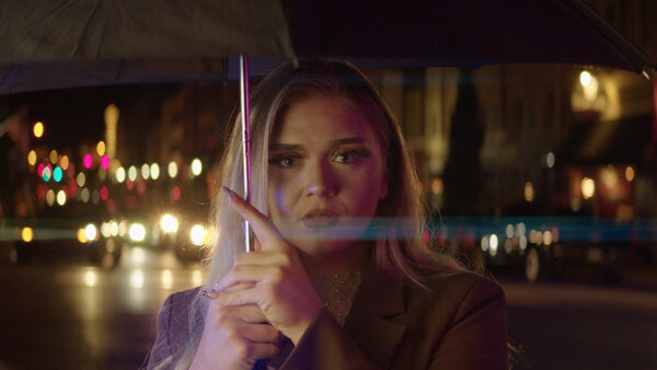 Girl Holding Umbrella at Night Clip 2 vfx asset stock footage