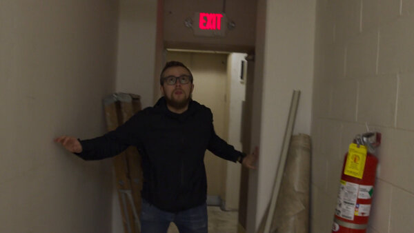 Man in Hallway During Earthquake
